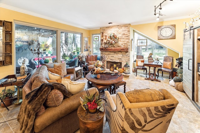 living room with a stone fireplace and crown molding