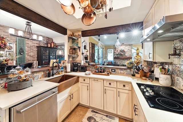 kitchen featuring black electric stovetop, kitchen peninsula, brick wall, sink, and ventilation hood