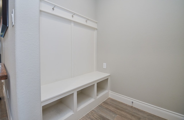 mudroom with dark hardwood / wood-style flooring