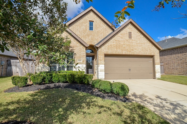 view of front facade featuring a front yard and a garage