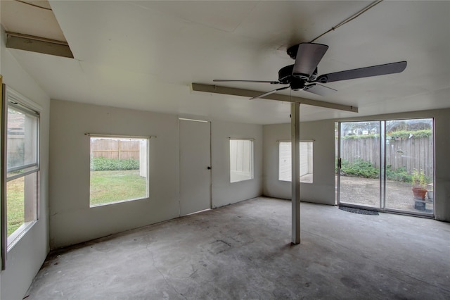 spare room with concrete flooring