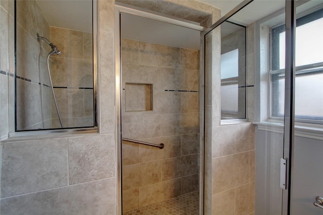 full bathroom featuring a stall shower