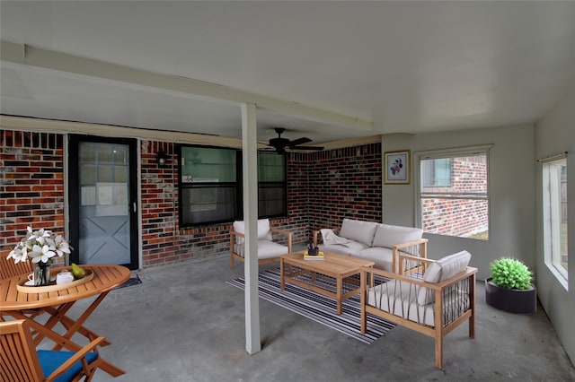 sunroom / solarium with ceiling fan