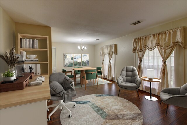 office featuring hardwood / wood-style flooring, plenty of natural light, and a notable chandelier