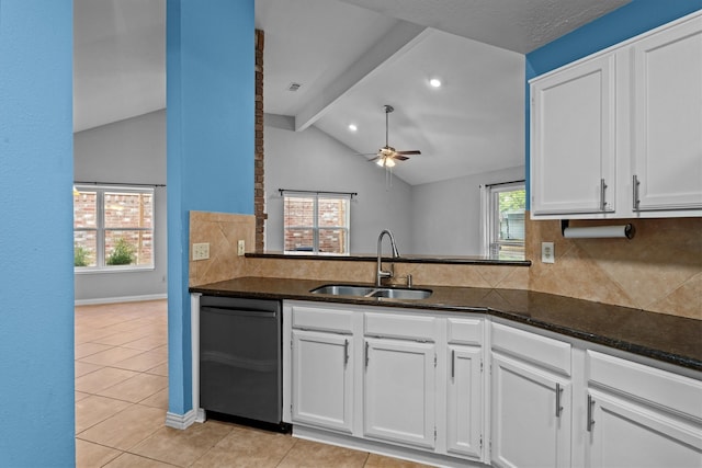 kitchen featuring vaulted ceiling with beams, dishwasher, sink, and white cabinets