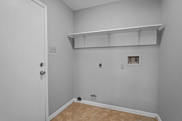 clothes washing area featuring hookup for an electric dryer, gas dryer hookup, and hookup for a washing machine