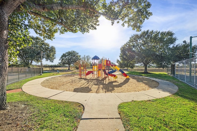 view of jungle gym featuring a yard