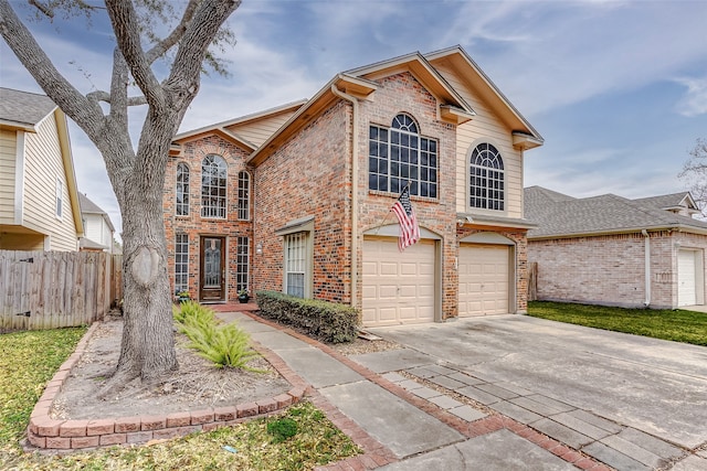 view of property with french doors and a garage