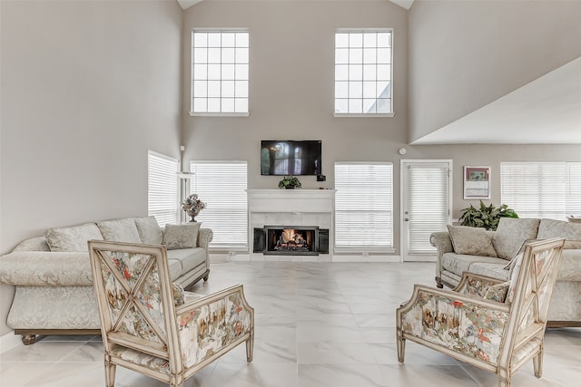 living room with a high ceiling