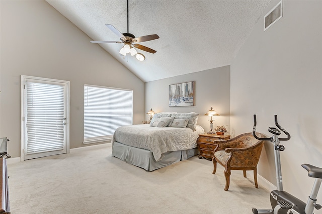 carpeted bedroom featuring ceiling fan, high vaulted ceiling, and a textured ceiling