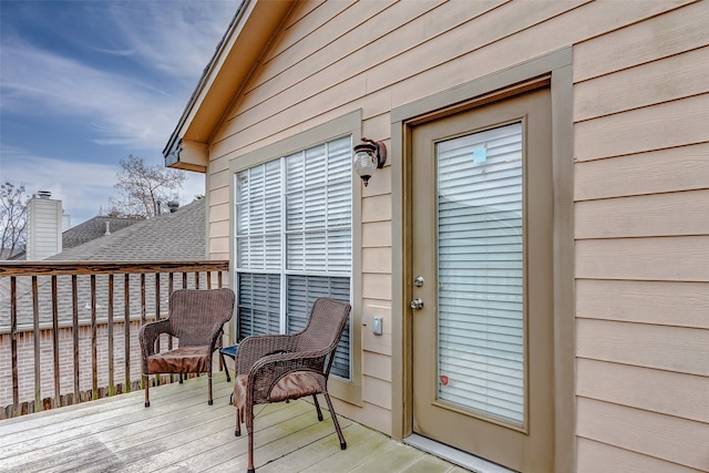 property entrance with a deck