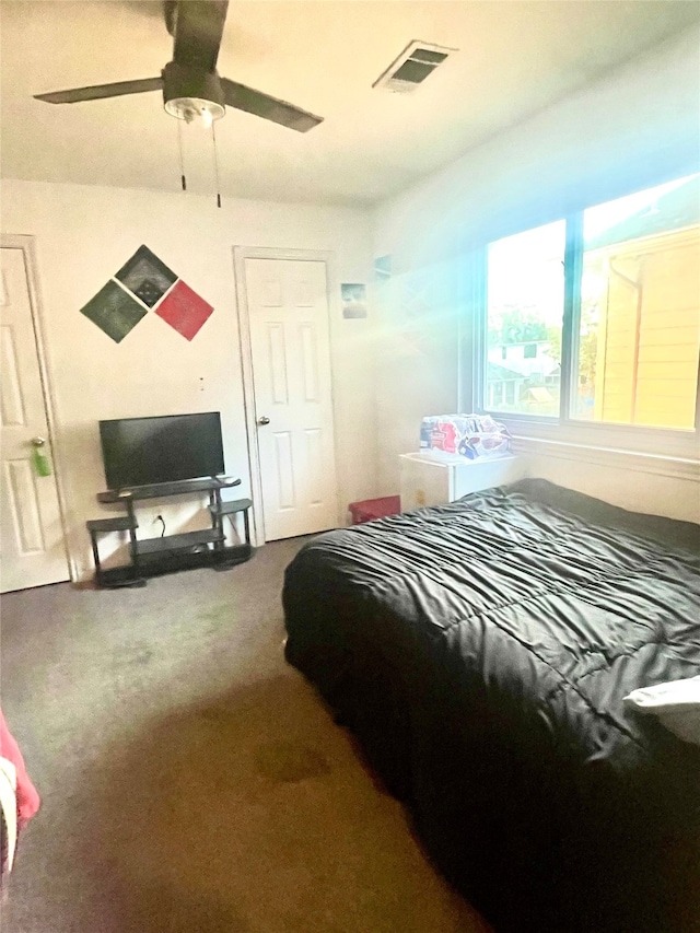 bedroom featuring carpet flooring and ceiling fan