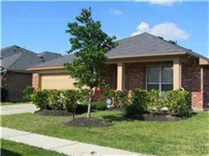 single story home featuring a front yard