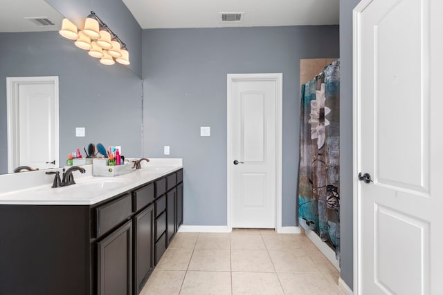 bathroom with tile patterned flooring, vanity, and a shower with shower curtain