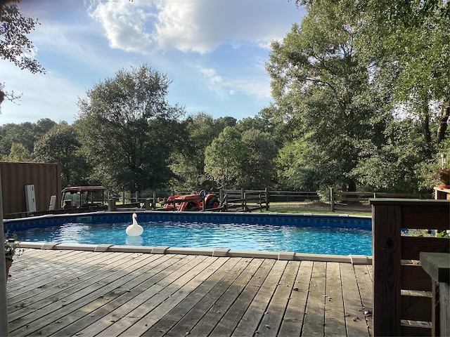 view of pool with a deck