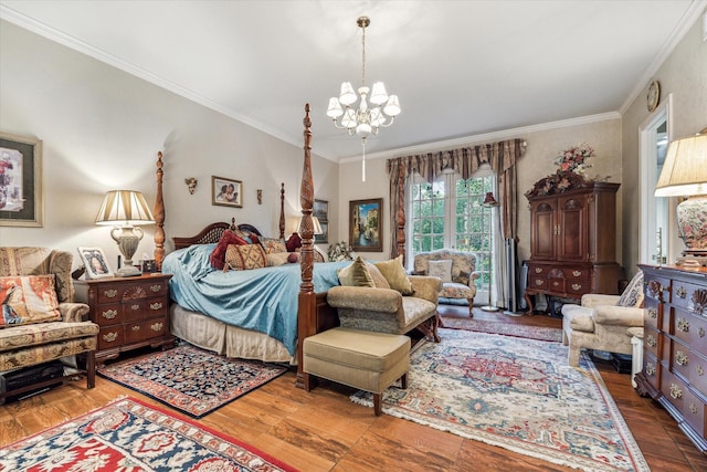 bedroom featuring ornamental molding, a chandelier, and wood finished floors