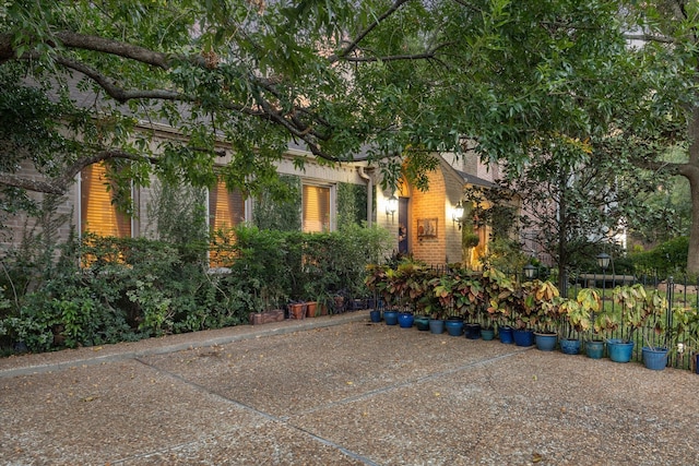 view of property exterior featuring brick siding