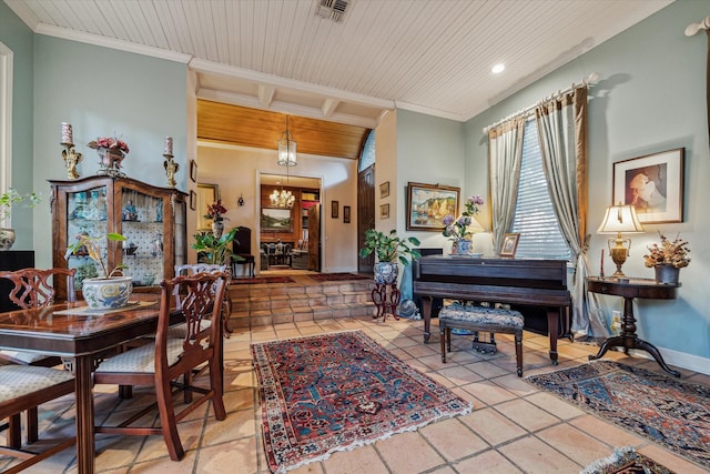 sitting room featuring baseboards, visible vents, wood ceiling, ornamental molding, and a notable chandelier