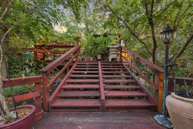 view of gate with stairway