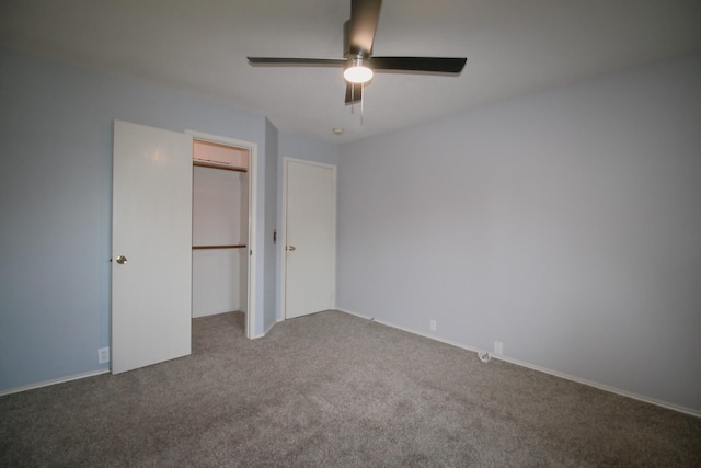 unfurnished bedroom featuring ceiling fan, carpet, and a closet