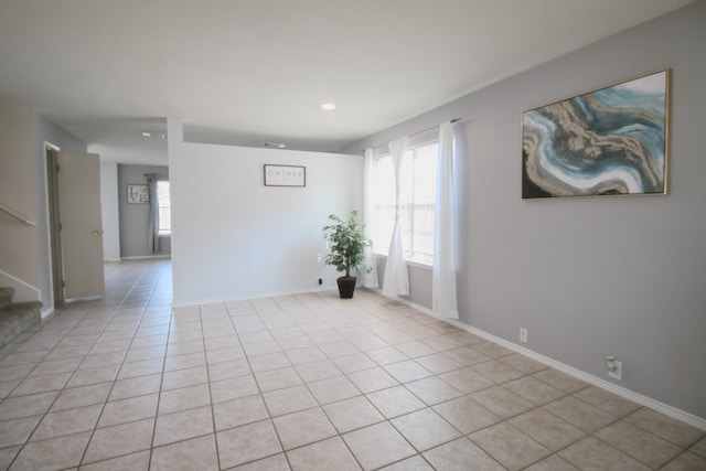 empty room featuring light tile patterned flooring