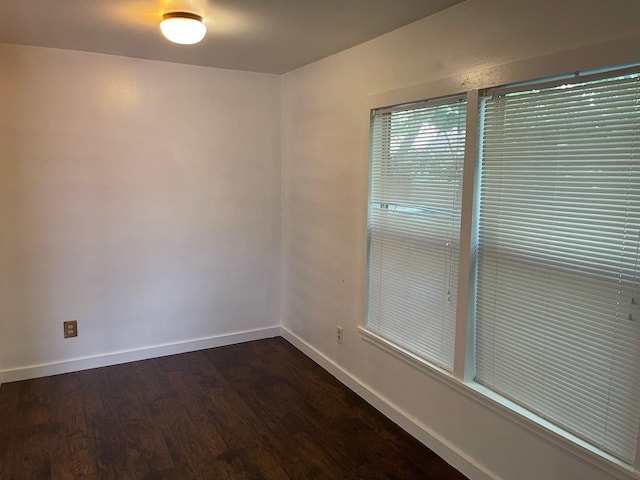 empty room featuring dark hardwood / wood-style floors