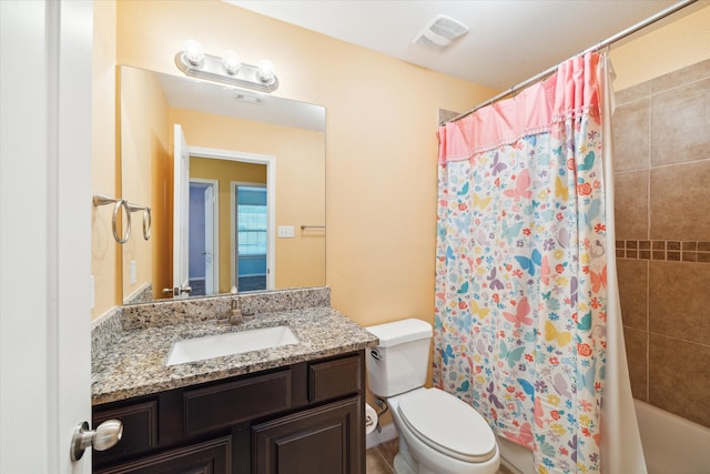 full bathroom with toilet, shower / bath combo, and vanity