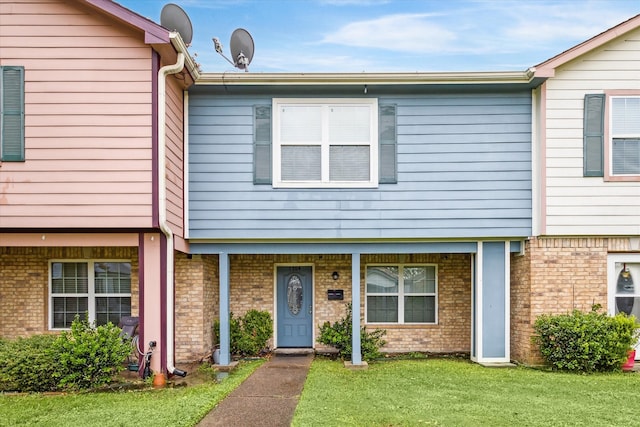 view of front of home with a front lawn