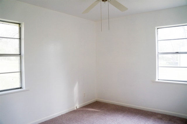 unfurnished room featuring carpet floors and ceiling fan