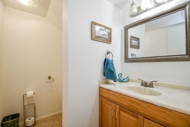 bathroom featuring tile patterned floors and vanity