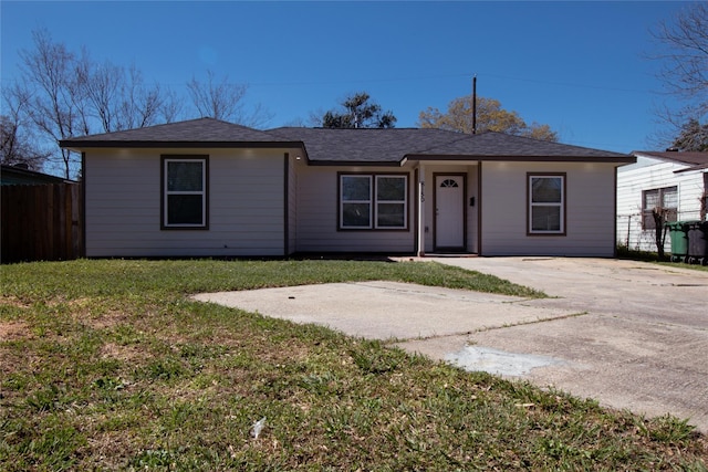 ranch-style house with a front yard