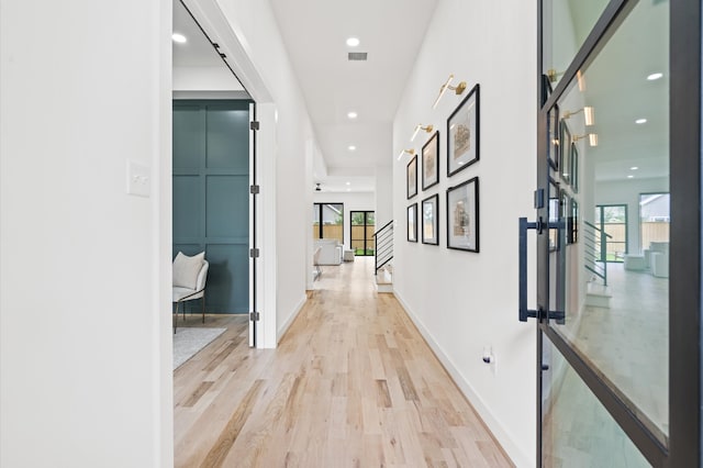 corridor featuring light wood-type flooring