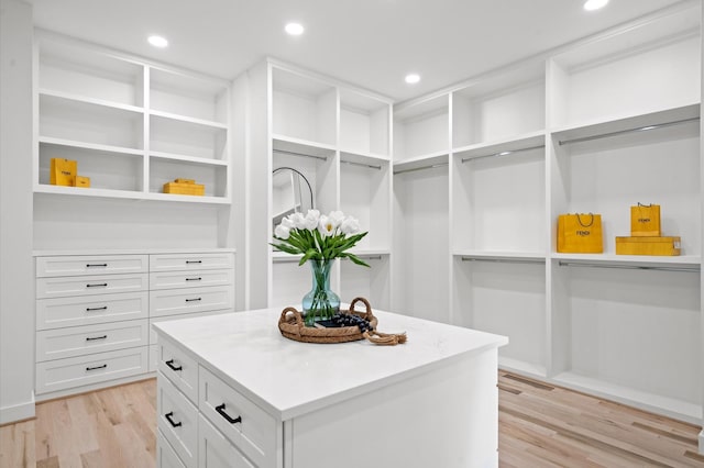 walk in closet featuring light hardwood / wood-style floors