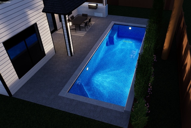 view of swimming pool with outdoor lounge area and a patio