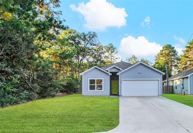 view of front of house with a front lawn and a garage