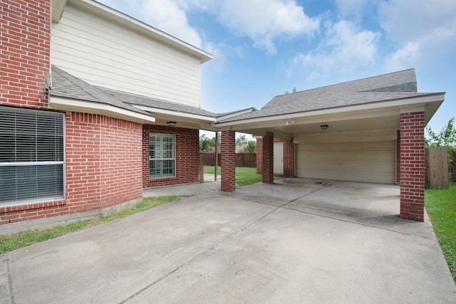 view of side of home featuring a garage