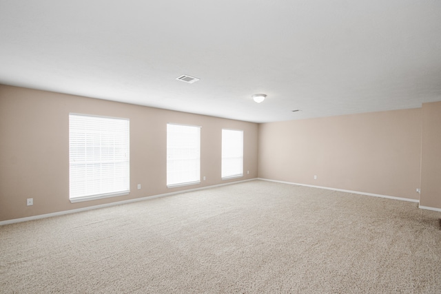 view of carpeted spare room