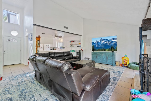 1603 Cantrell Blvd, Conroe, TX 77301 - tiled living area featuring high vaulted ceiling and ceiling fan