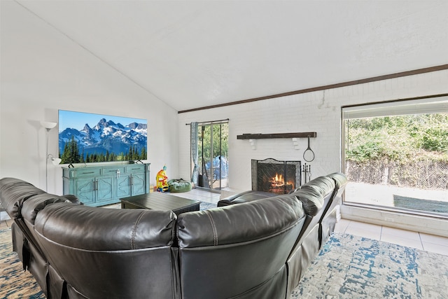 living room featuring a wealth of natural light, high vaulted ceiling, and light tile patterned floors