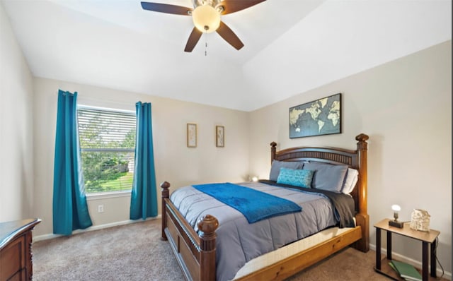 carpeted bedroom featuring lofted ceiling and ceiling fan