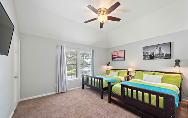 bedroom featuring ceiling fan and light carpet