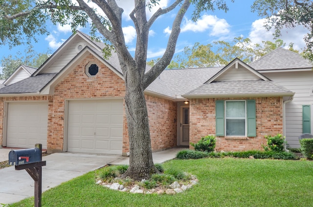 ranch-style home featuring a front yard and a garage