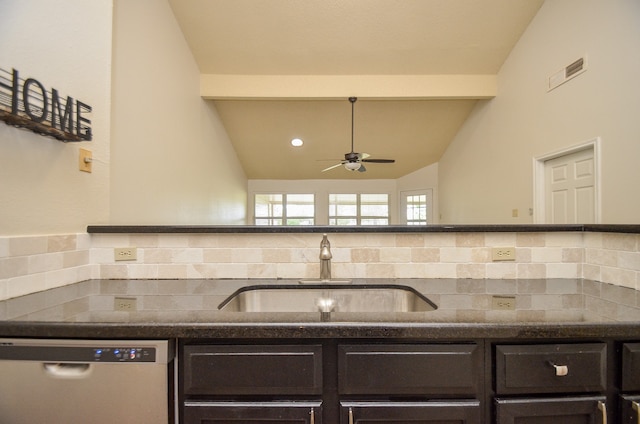 kitchen with sink, ceiling fan, lofted ceiling, dishwashing machine, and decorative backsplash