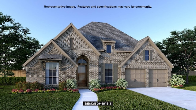 tudor-style house with a front yard and a garage