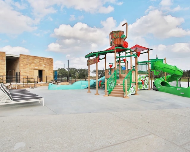 community play area featuring fence