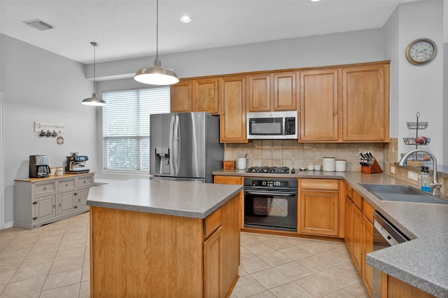 kitchen featuring light tile patterned floors, backsplash, sink, pendant lighting, and stainless steel appliances