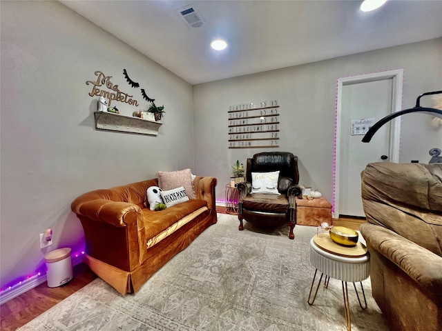 sitting room featuring hardwood / wood-style floors