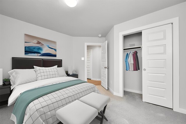 bedroom featuring a closet and light colored carpet