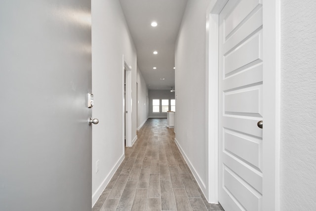 hallway with light wood-type flooring