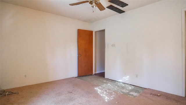 unfurnished room featuring ceiling fan and light colored carpet